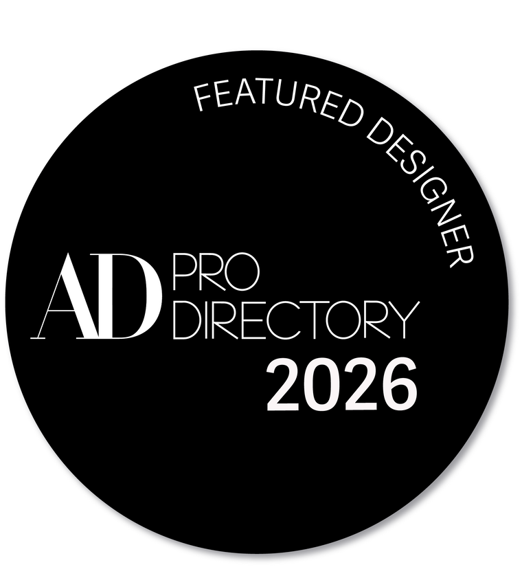 Circular badge with 'Featured Designer AD Pro Directory 2026' text on a black background