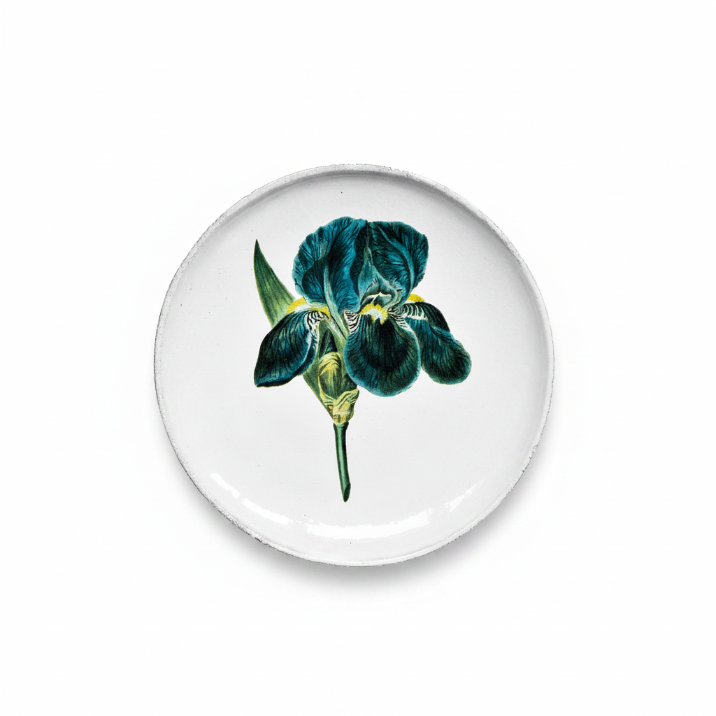 Round ceramic plate with a blue iris flower design on a white background