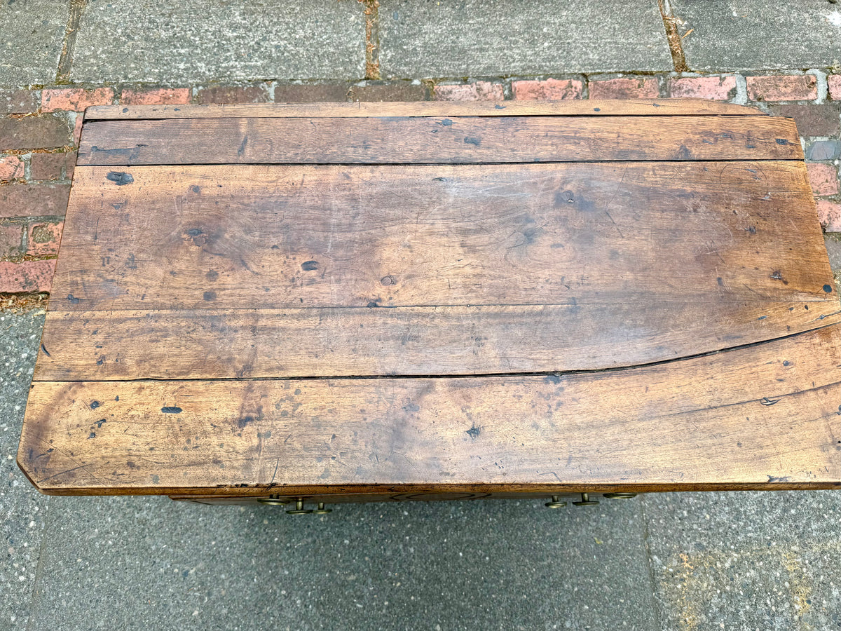 Old wooden table on a concrete surface