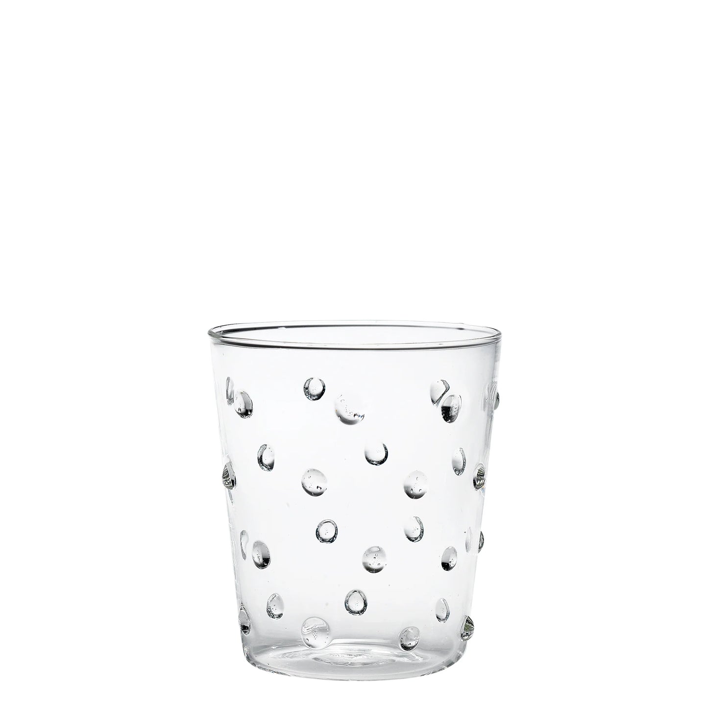 Clear glass tumbler with bubble design on a white background