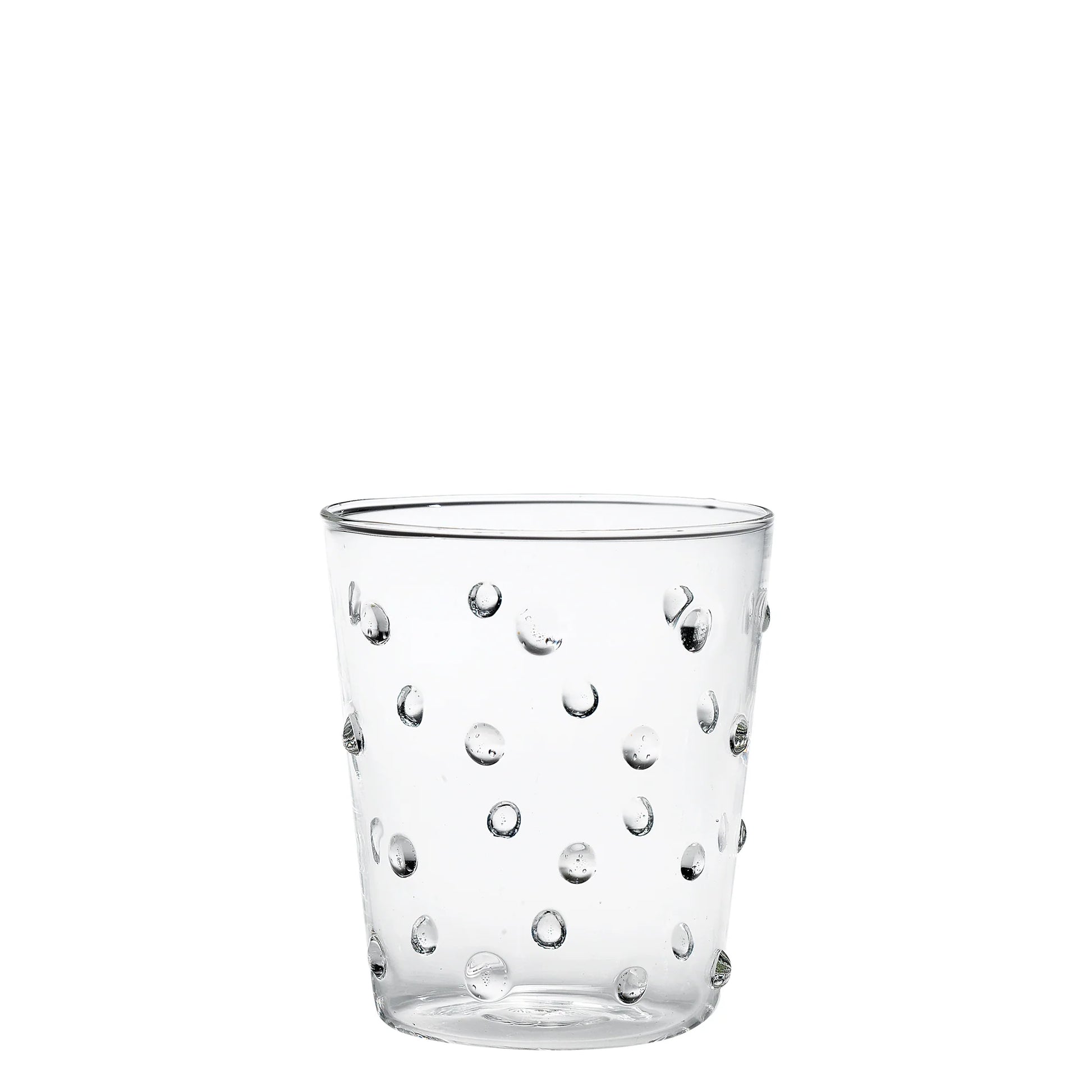 Clear glass tumbler with bubble design on a white background